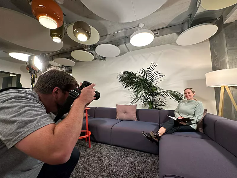 Behind the scenes photography of Greg Brown on location with a customer